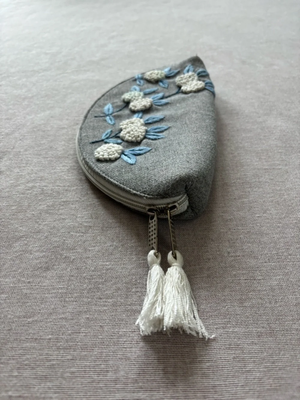 Grey embroidered floral half moon whimsical coquette clutch bag.
